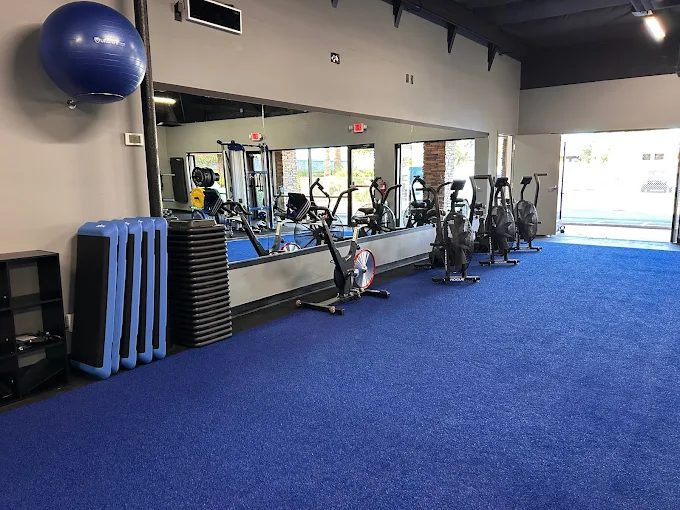 Turf conditioning area with air bikes and step platforms